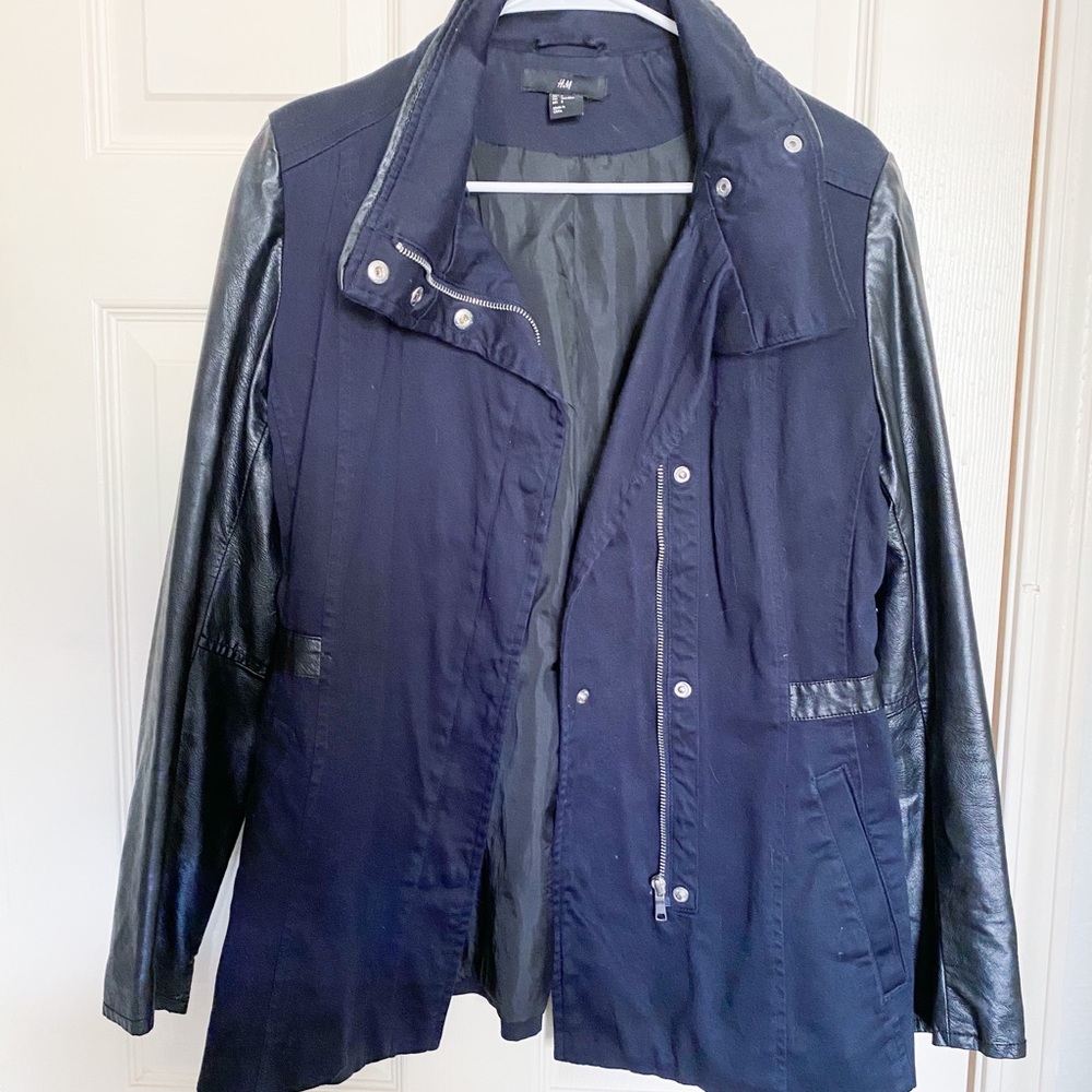 Navy blue and black leather jacket